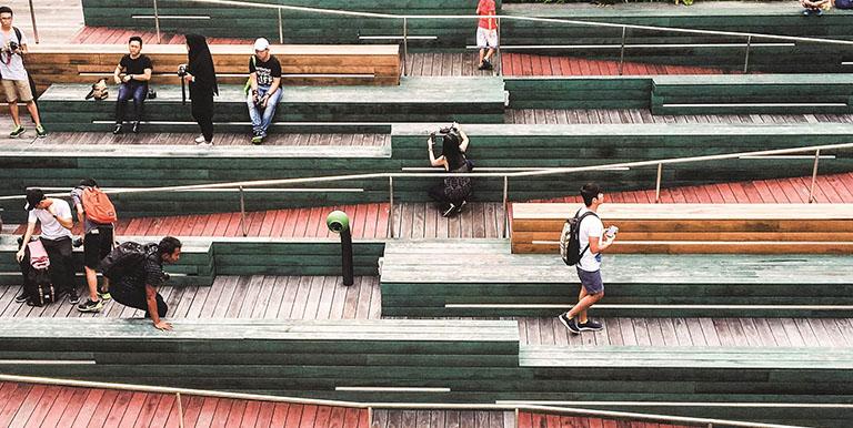 Architectural firm WOHA turned a wheelchair-unfriendly courtyard with steep slopes into an inclusive amphitheatre with a gentle, uninterrupted ramp. Photo credit: Chan Hao Ong