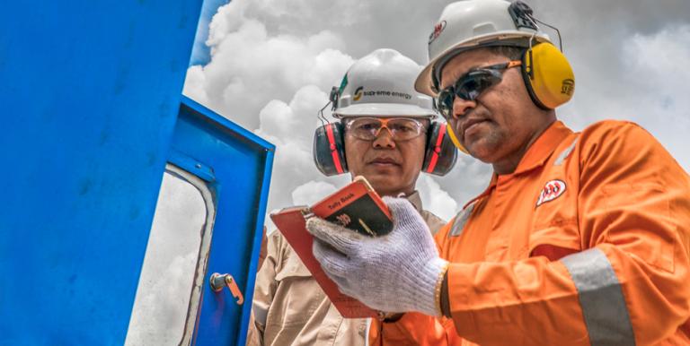 Workers record data at a project site. Photo credit: Gerard Joren/ADB.