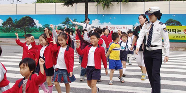 Children participate in a traffic safety campaign held in Gunsan City in the Republic of Korea. Photo credit: The Korea Transport Institute.