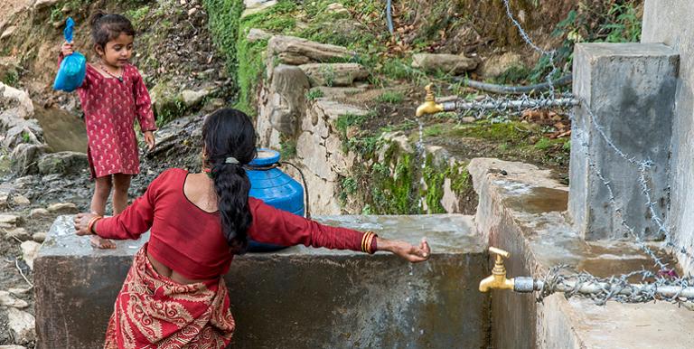 Community taps and pumps save women and children in rural Nepal from trekking long distances to fetch water.  Photo exclusively licensed to the Asian Development Bank until 2021.