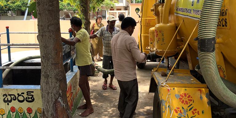 Emptying a vacuum tanker at a sewer discharge point in Visakhapatnam, India. Photo credit: Water & Sanitation for the Urban Poor.