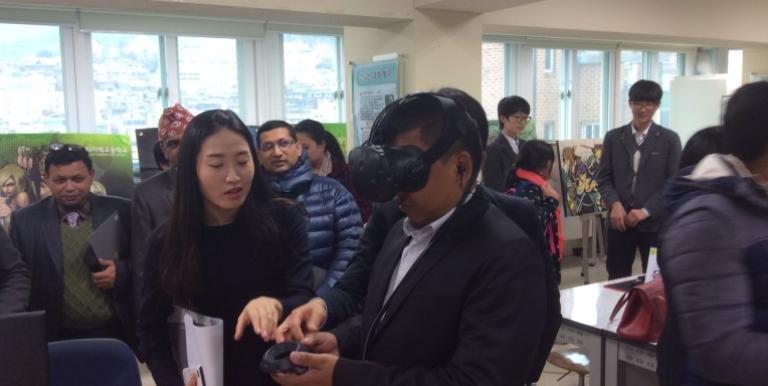 A visitor to Seoul Digitech High School tries on a virtual reality headset. The Republic of Korea has a highly developed and integrated ICT system in its education sector. Photo credit: ADB.