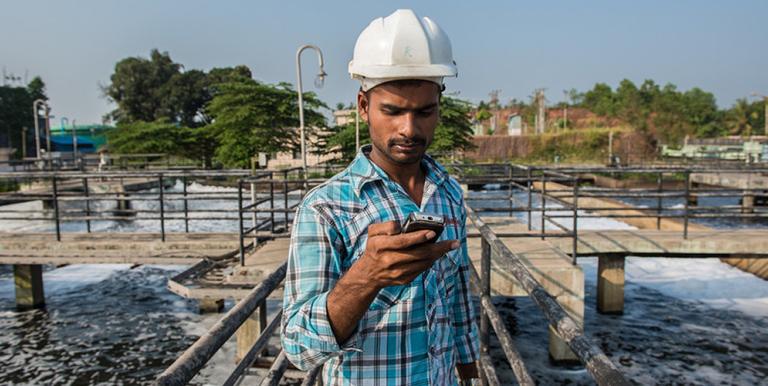 More feature phone-friendly processes could be developed where there is low penetration of smartphones. Photo credit: ADB.