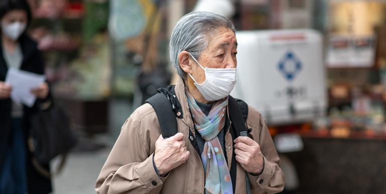 An older woman crosses a street at Tokyo’s Shibuya. Photo credit: Asian Development Bank. 