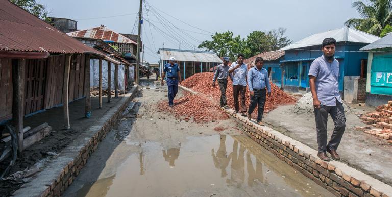 City officials inspecting the implementation of a coastal climate resilient infrastructure project in Bangladesh. Photo credit: ADB.