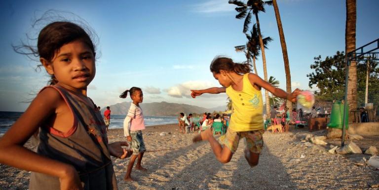 Children playing on Dili beach, Timor-Leste. Photo credit: ADB.