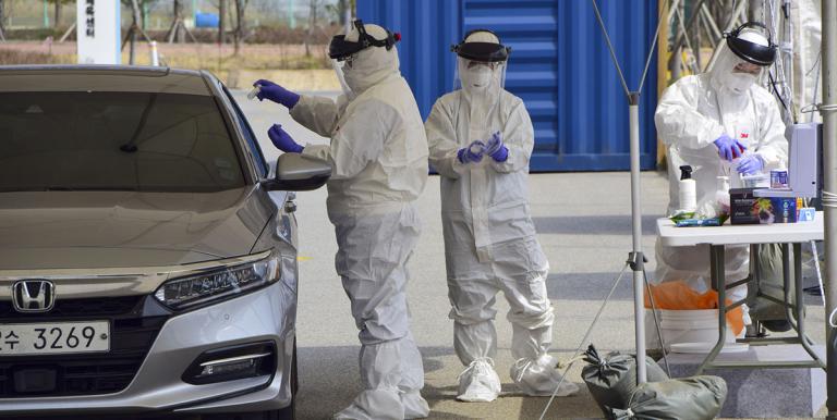 A drive-through screening center in Incheon collects specimens for COVID-19 diagnostic testing. Photo credit: iStock/Goldcastle7.