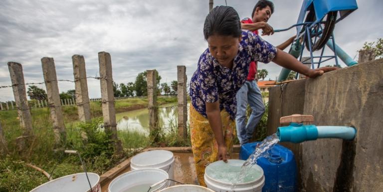 A Cambodian farmer at an ADB-supported community well in Banteay Meanchey province.