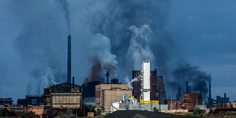 Smoke rises from a factory in developing Asia. Photo credit: ADB.